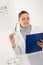 Optician doctor woman with glasses and eye chart