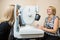 Optician Examining Patient\'s Eye With Retina