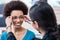 Optician showing woman new glasses