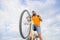 Optimise cycling performance. Man bearded hipster rides bicycle bottom view sky background. Modern bicycle riding