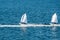 Optimist sailboat during a training