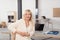 Optimistic Adult Office Lady Sitting at her Table