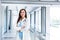 Optimistic female doctor posing at hospital indoor