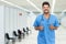 Optimistic hispanic male doctor is ready for vacinating patients