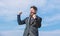 Optimistic mood. Success and luck. Being optimistic. Man bearded optimistic businessman wear formal suit sky background