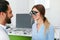 Optometry Test. Eye Doctor Checking Woman Eyesight At Clinic