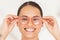 Optometry, vision and portrait of woman with glasses trying on new frame for prescription lenses. Happy, smile and lady