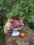 Opulence of autumn fruits in an earthenware bowl