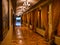 Opulent corridor with marble floor and curtains