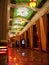 Opulent corridor with marble floor and curtains