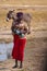 Opuwo, Namibia - Jul 06, 2019: Namibian women with her donkey, seen in Opuwo in the Kunene Region of Namibia