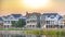 Oquirrh Lake and homes against a golden sky