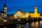 Oradea City Hall on embankment in twilight