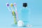 Oral hygiene. Toothbrush, dental floss and rinse for mouth and teeth on a gentle blue background