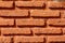 Orang brick wall