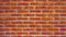 Orange abstract colorful damaged rustic brick wall brickwork stonework masonry texture background pattern