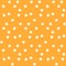 Orange background random polka dots seamless pattern