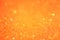 Orange background with a thin focus part and a defocus part. Defocus light abstract