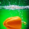 Orange Bell Pepper Water Splashes Freeze Motion Green Background Fresh Vegetables Concept