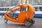 Orange bike taxi in Holland