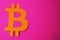 Orange bitcoin sign on a pink background with a copy space. Cryptocurrency in the style of minimalism