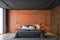 Orange and black master bedroom interior