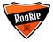 Orange and black shield with ROOKIE text.