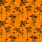 Orange and black spider webs drawn on an orange background