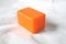 Orange block of bar soap