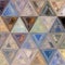 Orange and blue pastel colors triangles mosaic of transparent elements