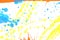 Orange, Blue and Yellow Acrylic Paint Splatters and Lines on White Background