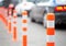 Orange bollard on the road.