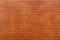 Orange brick patterned brick wall background, wall texture and backdrop for architectural materials