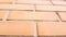 Orange brick wall. Closeup review