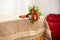 Orange bridal bouquet on a beige tablecloth