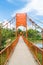 Orange bridge cross the river at Jung cave in Vang Vieng,