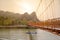 Orange bridge over song river in Vang Vieng,Laos