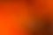 Orange, brown and black smooth and blurred wallpaper / background