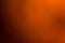 Orange, brown and black smooth and blurred wallpaper / background