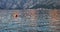 Orange buoy floating in a clean and calm sea landscape â€“ Nautical and Sea Video Background