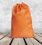 Orange Burlap bag with Drawstring canvas.