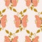Orange butterflies and leaves in a seamless pattern design
