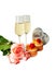 Orange cakes, glasses of champagne, pink roses and gift box isolated