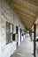 ORANGE, CALIFORNIA - 20 SEPT 2023: Corridor with room doors and window air conditioners at the Angel Motel on Chapman Avenue