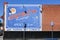 ORANGE, CALIFORNIA - 24 MAR 2023: Sign on the side of The District Lounge, a club with dancing and music bar food and a variety of