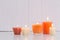 Orange candles on white background