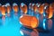 Orange capsule pills on blue background. Medical, future pharmacy, generative ai