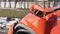 Orange car crash background. Close-up detail of auto wreck. Front side of crashed car from accident. Car accident