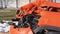 Orange car crash background. Close-up detail of auto wreck. Front side of crashed car from accident. Car accident.