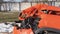 Orange car crash background. Close-up detail of auto wreck. Front side of crashed car from accident. Car accident.